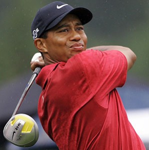 tiger.woods.golfing